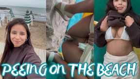 Peeing on the beach