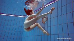 ”Martina poses with her juicy body”