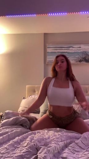 TikTok babe shows off her arched back in a tight dress