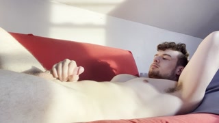 Solo male jerking his big cock on the couch