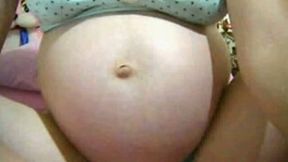 Pregnant white lady on webcam jiggles her big milky boobies