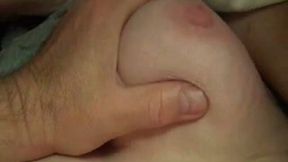 Homemade clip with me playing with my chubby wife's big tits