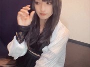 Individual video A video of a transvestite with long black hair quietly masturbating