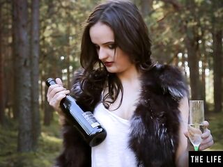 See as this babe masturbates wildly using a wine bottle as a sex tool