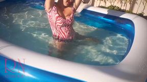 Elegant And Flexible Babe Swimming Underwater In The Outdoor Swimming Pool. Swimmingsuite