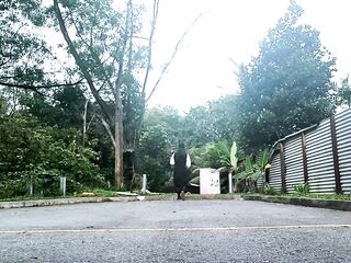 Sissy in chastity catwalk outdoors