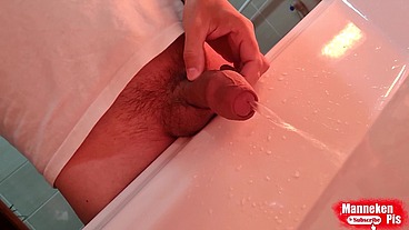 Close-up of urine stream