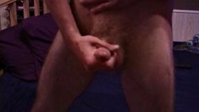 Lip pierced skater boy Jonathan Priest comes home from a day of hard skateboarding to enjoy some porn. He reveals pierced nipples, hairy legs, big balls, and a long hard cock.