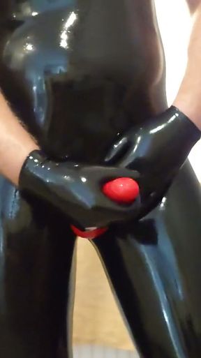 Handjob in rubber catsuit   Clip 1