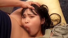 Her legs are spread in an M shape and a vibrator is inserted and removed.