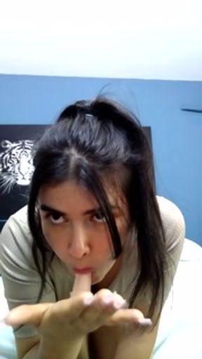 I suck a dildo and masturbate thinking about my neighbor's cock.