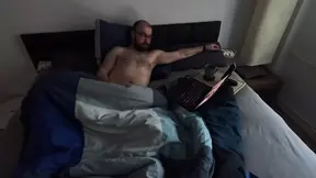 Watching porn in bed