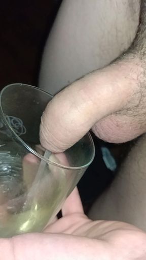 A small cock of a young gay pissing