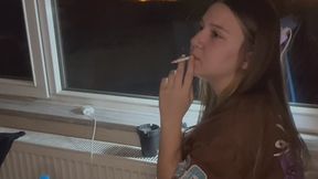 YULIANA SMOKE BY THE WINDOW