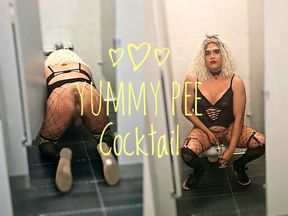 Sissy femboy drinks pee in public stall