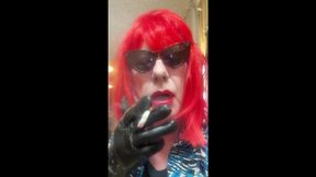 MRS. ROMAN DESTROYING A MARLBORO 100 MENTHOL CLOSE UP - WITH DANGLING AND NOSTRIL EXHALES