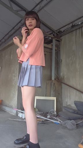 A Pleated Skirt Paired with White Underwear, and an Anal Plug Inserted on the Terrace