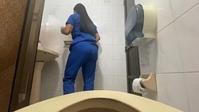 Hot nurse shows off in public restroom