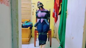 Hijab Indo Taped To A Chair