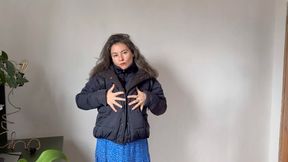 Charmy cleans her down jacket with her blue powerful vacuum aV