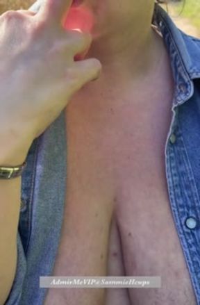 Milf getting her tits out and fingering her self on a walk
