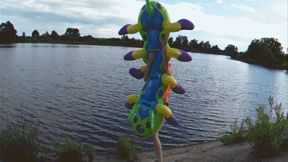 Alla blows away a rare inflatable caterpillar on the shore!!!