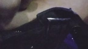 A goth girl in the Midnight in a water place in public