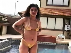 Attractive Asian beauty Nicole Dallas loves to put her body on display
