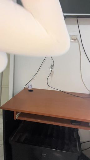 Slim blonde amateur works her magic at the office desk with computer