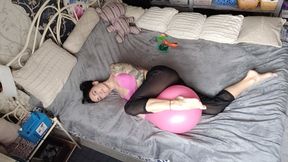 The camera from above captures me playing with a balloon - Mishel Looner balloons