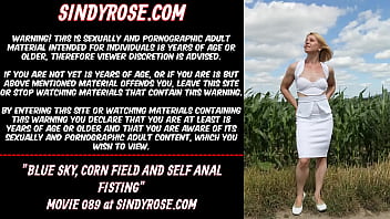 Sindy Rose, prolapse, blue sky, corn field and self anal fisting