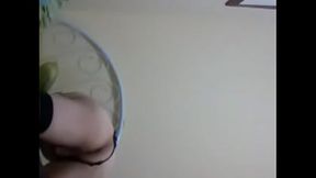 Crossdresser playing with dildo