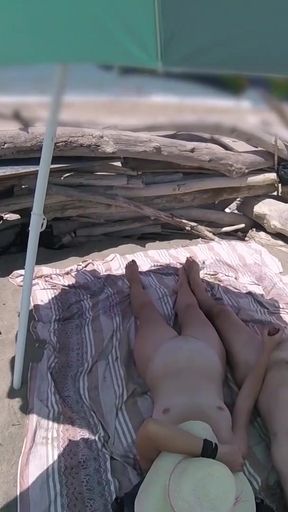 Captivating moment from &quot;#2 Exhibitionist Wife Outdoor Amateur Milf Handjob Big Cock on Nudity Beach public in front of&quot;