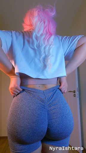 Pink-haired e-girl pulls up her booty shorts