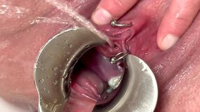 strong stream pee from my spread out pussy by speculum