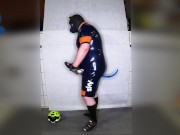 Rubber Cyclist Pup enjoying his gear (sniffing & pawing off)