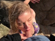 Model blows photographer on the beach and swallows cum