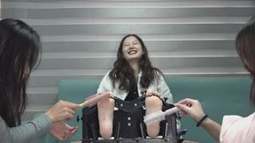 Ci Ci, Domi and Yi - turn based foot tickling while in the pillory