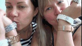 Two sexy ladies masturbate with wristwatch 2Wb