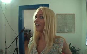 Blonde Beauty with Long Hair and Occasional Sweet Smile