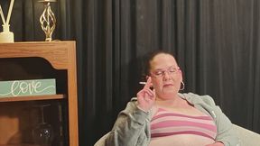 Sitting on chaise smoking 2 Marlboro Menthol Gold 100s