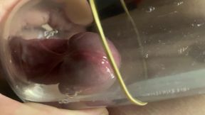 Sexy man collects his precum in a bottle of water for female eyes.