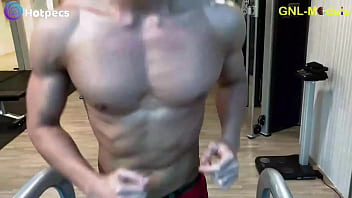 Hot Asian guy training hard his pecs for nipple play!