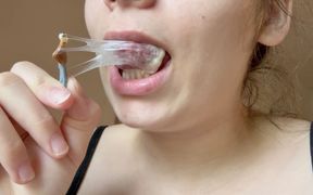 A Giantess Stepmom Traps Her Tiny Ex-husband in a Trap Made of Chewing Gum; She Chews, Blows Bubbles,