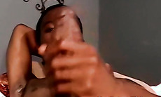 Young black jock sucked by two mature homosexuals