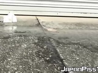 Naughty Japanese cuties pissing in the streets