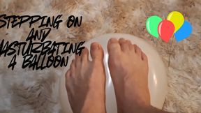 Stepping on and masturbating a balloon
