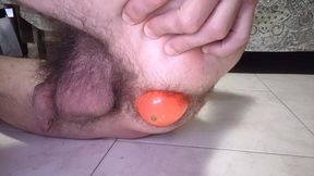 Asshole close-up with a big mango inside, ass stretching and gape