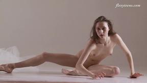 ”Natural tits Ksyuha Zavituha doing nude gymnastics”