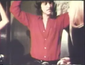 Horny swinging couples get down at a retro USA orgy party